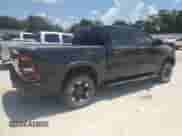 2023 Ram 1500 Rebel with VIN 1C6SRFLT4PN554816, listed as a Copart auction lot 66319915 with 96,984 mi miles and Salvage title. Bid and sale history available at DreamBid. Image 3.