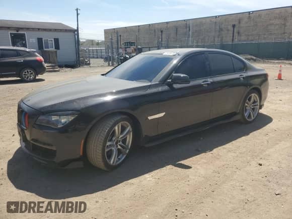 2014 BMW 7 Series 750i xDrive с VIN WBAYB6C52ED224536, выставлен на аукционе Copart как лот 54397595 с пробегом 107 410 миль миль и Списание • Salvage title. История ставок и продаж доступна на DreamBid. Изображение 1.
