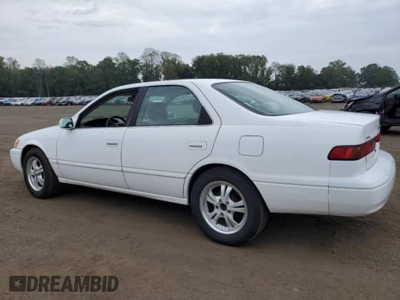 1999 Toyota Camry LE z VIN JT2BG22KXX0272539, wystawiony jako Copart lot #83966585 z przebiegiem 189 447 mil mil oraz Szkoda całkowita • Salvage title. Historia ofert i sprzedaży dostępna na DreamBid. Obrazek 2.