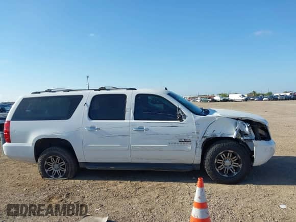 2013 Chevrolet Suburban LS с VIN 1GNSCHE01DR159304, выставлен на аукционе IAAI как лот 43107620 с пробегом 225 821 миль миль и . История ставок и продаж доступна на DreamBid. Изображение 14.