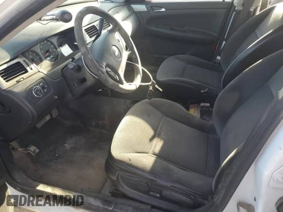 2012 Chevrolet Impala Police Police with VIN 2G1WD5E31C1151753, listed as a Copart auction lot 46351215 with 128,468 mi miles and Salvage title. Bid and sale history available at DreamBid. Image 7.