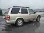 2002 Nissan Pathfinder SE with VIN JN8DR09Y72W704622, listed as a Copart auction lot 67056785 with 162,122 mi miles and Salvage title. Bid and sale history available at DreamBid. Image 3.