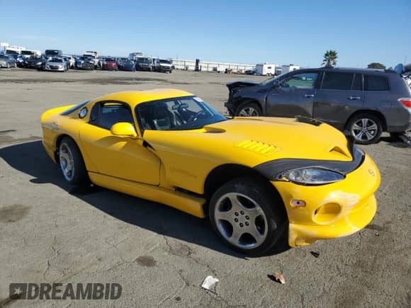 2002 Dodge Viper GTS с VIN 1B3ER69E72V102108, выставлен на аукционе Copart как лот 80082204 с пробегом 118 759 миль миль и Списание • Salvage title. История ставок и продаж доступна на DreamBid. Изображение 4.