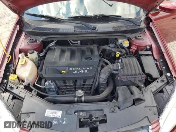 2014 Chrysler 200 LX с VIN 1C3CCBAB8EN122846, выставлен на аукционе Copart как лот 71610855 с пробегом 129 140 миль миль и Списание • Salvage title. История ставок и продаж доступна на DreamBid. Изображение 11.