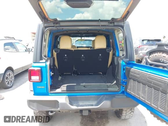 2022 Jeep Wrangler Unlimited Willys Sport с VIN 1C4HJXDM6NW141603, выставлен на аукционе IAAI как лот 42687693 с пробегом 37 180 миль миль и . История ставок и продаж доступна на DreamBid. Изображение 18.