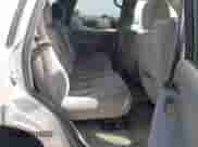 2005 Chevrolet Tahoe LT z VIN 1GNEC13T25J147583, wystawiony jako IAAI lot #42275971 z przebiegiem 244 307 mil mil oraz . Historia ofert i sprzedaży dostępna na DreamBid. Obrazek 8.