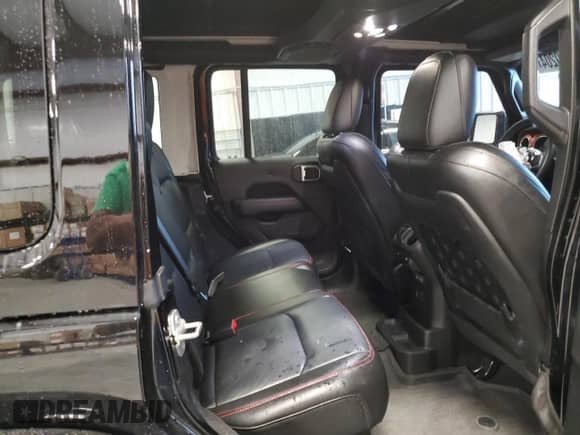 2023 Jeep Wrangler Rubicon Farout z VIN 1C4JJXFM0PW588123, wystawiony jako Copart lot #73050204 z przebiegiem 18 477 mil mil oraz Szkoda całkowita • Salvage title. Historia ofert i sprzedaży dostępna na DreamBid. Obrazek 10.