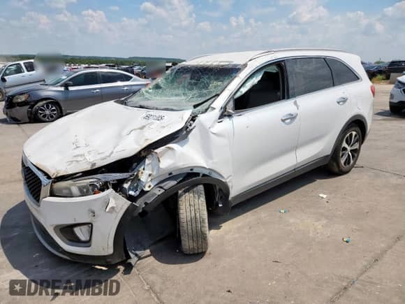2016 Kia Sorento EX with VIN 5XYPH4A12GG186490, listed as a Copart auction lot 69231385 with 115,060 mi miles and Salvage title. Bid and sale history available at DreamBid. Image 1.