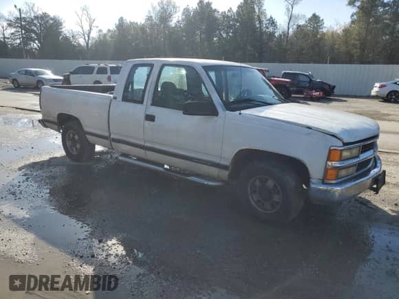 1995 GMC Sierra 1500 z VIN 2GTEC19K4S1556679, wystawiony jako Copart lot #86879064 z przebiegiem 399 030 mil mil oraz Szkoda całkowita • Salvage title. Historia ofert i sprzedaży dostępna na DreamBid. Obrazek 4.