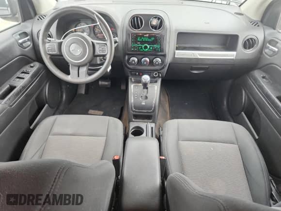2014 Jeep Compass Sport с VIN 1C4NJCBA7ED515572, выставлен на аукционе Copart как лот 68657185 с пробегом 158 857 миль миль и Списание • Salvage title. История ставок и продаж доступна на DreamBid. Изображение 8.
