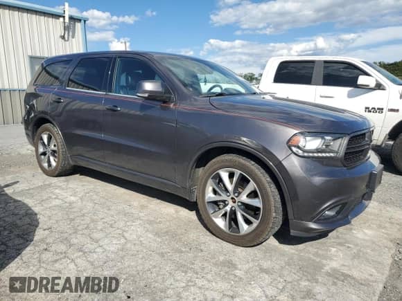 2014 Dodge Durango R/T with VIN 1C4SDJCT0EC978982, listed as a Copart auction lot 70347785 with 136,373 mi miles and Salvage title. Bid and sale history available at DreamBid. Image 4.