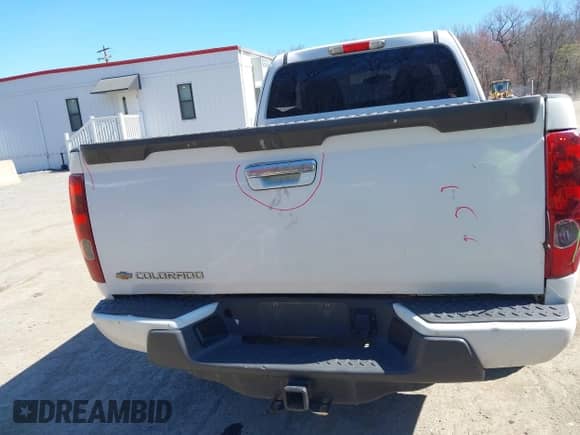 2012 Chevrolet Colorado Work Truck z VIN 1GCJTBFE8C8165200, wystawiony jako IAAI lot #41900797 z przebiegiem 101 023 mil mil oraz . Historia ofert i sprzedaży dostępna na DreamBid. Obrazek 16.