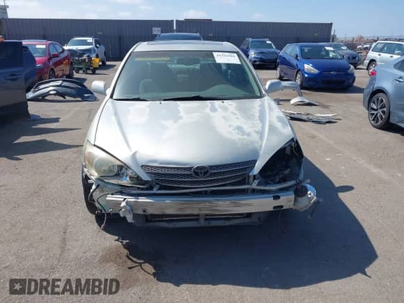 2002 Toyota Camry XLE with VIN JTDBF30K220003205, listed as a IAAI auction lot 43326504 with 180,560 mi miles and . Bid and sale history available at DreamBid. Image 13.