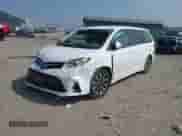 2019 Toyota Sienna LE with VIN 5TDJZ3DC4KS215106, listed as a IAAI auction lot 42940890 with 97,535 mi miles and . Bid and sale history available at DreamBid. Image 18.