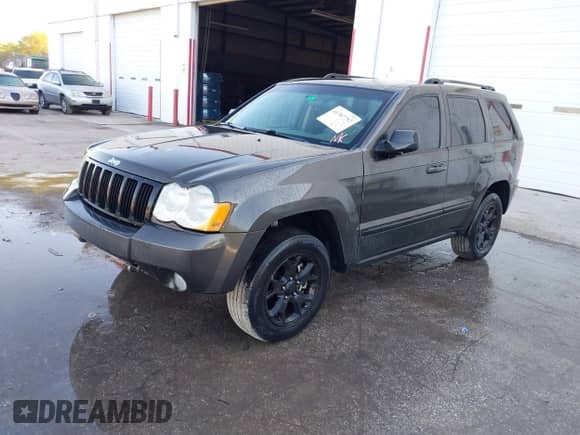 2006 Jeep Grand Cherokee Laredo with VIN 1J4HS48N76C357892, listed as a IAAI auction lot 41767752 with 142,734 mi miles and . Bid and sale history available at DreamBid. Image 2.