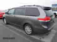 2013 Toyota Sienna XLE with VIN 5TDDK3DCXDS059061, listed as a IAAI auction lot 41777329 with 142,889 mi miles and . Bid and sale history available at DreamBid. Image 3.