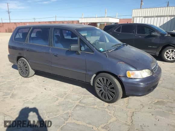 1996 Honda Odyssey с VIN JHMRA1844TC018990, выставлен на аукционе Copart как лот 79670674 с пробегом 172 720 миль миль и Списание • Salvage title. История ставок и продаж доступна на DreamBid. Изображение 4.