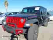 2021 Jeep Wrangler Unlimited Rubicon with VIN 1C4HJXFG1MW649077, listed as a IAAI auction lot 43496520 with 52,136 mi miles and . Bid and sale history available at DreamBid. Image 2.
