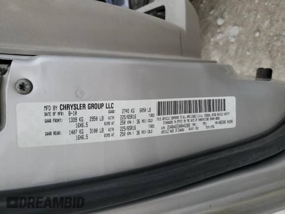 2010 Dodge Grand Caravan SE with VIN 2D4RN4DE9AR443389, listed as a Copart auction lot 57223315 with 379,870 mi miles and Salvage title. Bid and sale history available at DreamBid. Image 13.