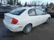 2004 Hyundai Accent GL z VIN KMHCG35C74U303431, wystawiony jako IAAI lot #41725717 z przebiegiem 211 893 mil mil oraz . Historia ofert i sprzedaży dostępna na DreamBid. Obrazek 4.