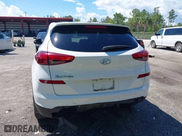 2021 Hyundai Tucson SE with VIN KM8J23A41MU318897, listed as a IAAI auction lot 43233832 with 112,924 mi miles and . Bid and sale history available at DreamBid. Image 15.