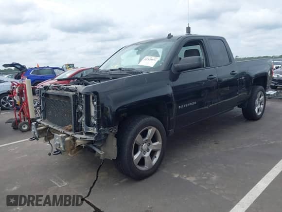 2014 Chevrolet Silverado 1500 LT with VIN 1GCVKREH3EZ143319, listed as a IAAI auction lot 43329073 with 181,512 mi miles and . Bid and sale history available at DreamBid. Image 2.