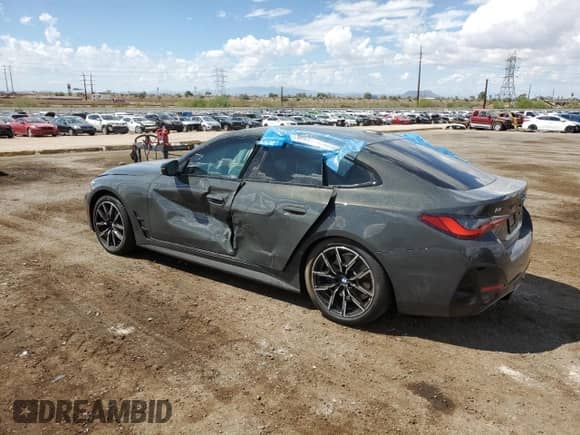 2025 BMW i4 eDrive40 with VIN WBY23HD05SFU42876, listed as a Copart auction lot 80259765 with 7,530 mi miles and Salvage title. Bid and sale history available at DreamBid. Image 2.