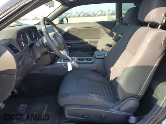 2014 Dodge Challenger SXT with VIN 2C3CDYAG3EH258158, listed as a Copart auction lot 82464185 with 120,539 mi miles and Salvage title. Bid and sale history available at DreamBid. Image 7.