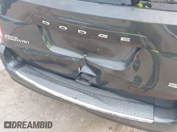 2012 Dodge Grand Caravan SXT with VIN 2C4RDGCG5CR294986, listed as a IAAI auction lot 42804374 with 183,596 mi miles and . Bid and sale history available at DreamBid. Image 6.