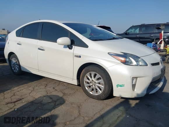 2014 Toyota Prius z VIN JTDKN3DP1E3057512, wystawiony jako IAAI lot #42976645 z przebiegiem 242 739 mil mil oraz . Historia ofert i sprzedaży dostępna na DreamBid. Obrazek 1.