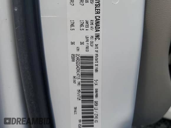 2014 Dodge Grand Caravan Crew z VIN 2C4RDGDG4ER414715, wystawiony jako Copart lot #51990885 z przebiegiem 130 951 mil mil oraz Nie do naprawy • Non repairable. Historia ofert i sprzedaży dostępna na DreamBid. Obrazek 13.