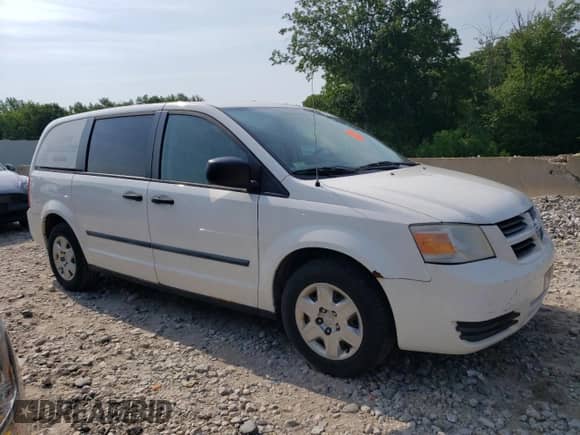 2009 Dodge Caravan with VIN 1D4HN11E79B508183, listed as a Copart auction lot 57297734 with 135,651 mi miles and Salvage title. Bid and sale history available at DreamBid. Image 4.