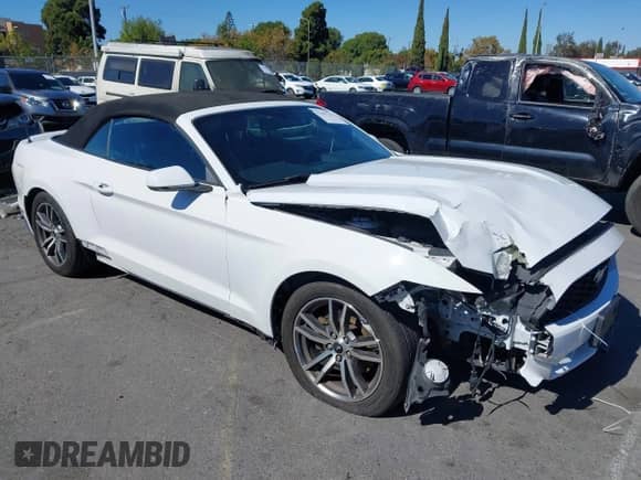 2015 Ford Mustang EcoBoost Premium z VIN 1FATP8UH9F5426696, wystawiony jako IAAI lot #43487142 z przebiegiem 128 295 mil mil oraz . Historia ofert i sprzedaży dostępna na DreamBid. Obrazek 1.