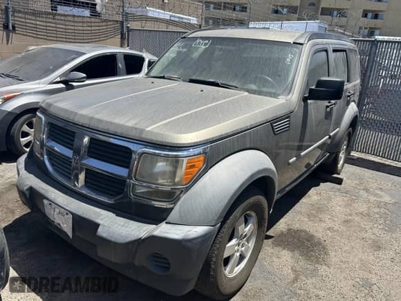 2007 Dodge Nitro SXT with VIN 1D8GT28K27W559016, listed as a IAAI auction lot 42896989 with 131,368 mi miles and . Bid and sale history available at DreamBid. Image 2.