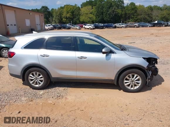 2019 Kia Sorento LX z VIN 5XYPGDA34KG437524, wystawiony jako IAAI lot #43227964 z przebiegiem 124 831 mil mil oraz . Historia ofert i sprzedaży dostępna na DreamBid. Obrazek 13.