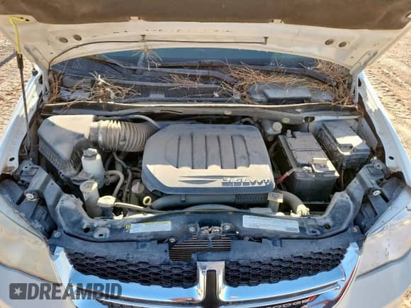 2011 Dodge Grand Caravan Express with VIN 2D4RN4DG8BR700514, listed as a Copart auction lot 72104035 with 94,946 mi miles and Clean title. Bid and sale history available at DreamBid. Image 12.