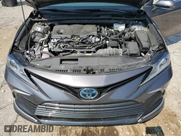 2024 Toyota Camry Hybrid LE with VIN 4T1H31AK1RU627128, listed as a Copart auction lot 61617385 with 28,872 mi miles and Salvage title. Bid and sale history available at DreamBid. Image 11.