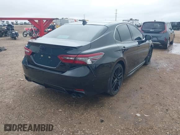 2023 Toyota Camry XSE with VIN 4T1K61AK4PU828838, listed as a IAAI auction lot 43087534 with 19,542 mi miles and . Bid and sale history available at DreamBid. Image 4.