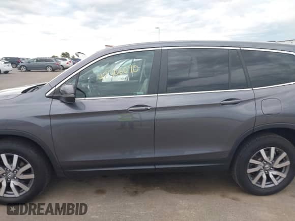 2020 Honda Pilot EX с VIN 5FNYF6H31LB036112, выставлен на аукционе IAAI как лот 42706090 с пробегом 72 383 миль миль и . История ставок и продаж доступна на DreamBid. Изображение 14.