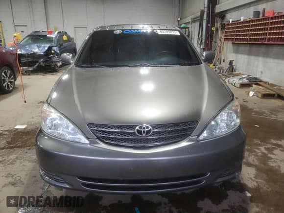 2003 Toyota Camry LE с VIN 4T1BF32K33U548784, выставлен на аукционе Copart как лот 85709875 с пробегом 175 340 миль миль и Списание • Salvage title. История ставок и продаж доступна на DreamBid. Изображение 5.