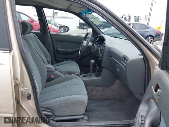 1992 Toyota Camry z VIN 4T1SK12W4NU110507, wystawiony jako IAAI lot #42236165 z przebiegiem 234 147 mil mil oraz . Historia ofert i sprzedaży dostępna na DreamBid. Obrazek 5.