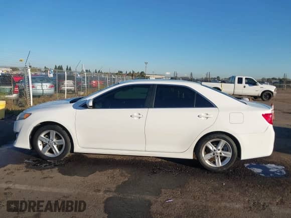 2014 Toyota Camry L z VIN 4T1BF1FK6EU751525, wystawiony jako IAAI lot #43496709 z przebiegiem 192 116 mil mil oraz . Historia ofert i sprzedaży dostępna na DreamBid. Obrazek 14.