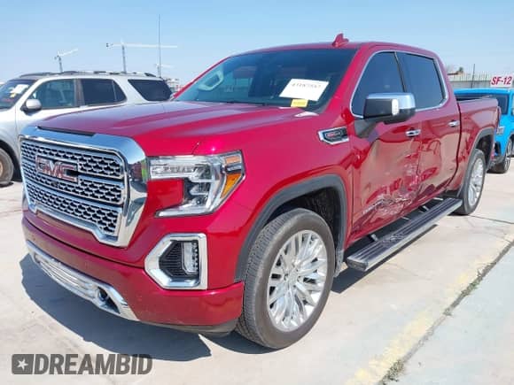 2019 GMC Sierra 1500 Denali z VIN 1GTU9FEL0KZ291790, wystawiony jako IAAI lot #43187557 z przebiegiem 80 187 mil mil oraz . Historia ofert i sprzedaży dostępna na DreamBid. Obrazek 17.