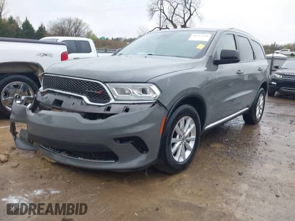 2023 Dodge Durango SXT with VIN 1C4RDHAG9PC569511, listed as a IAAI auction lot 41952170 with 55,653 mi miles and . Bid and sale history available at DreamBid. Image 2.