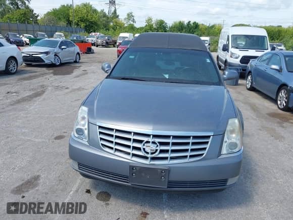 2006 Cadillac DTS Professional with VIN 1GEEH06YX6U500719, listed as a IAAI auction lot 42958023 with 97,040 mi miles and . Bid and sale history available at DreamBid. Image 12.