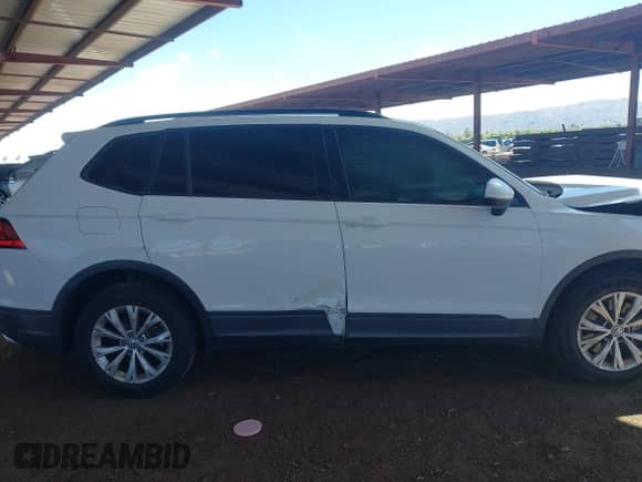 2018 Volkswagen Tiguan S с VIN 3VV1B7AX3JM067887, выставлен на аукционе IAAI как лот 43216100 с пробегом 124 903 миль миль и . История ставок и продаж доступна на DreamBid. Изображение 13.