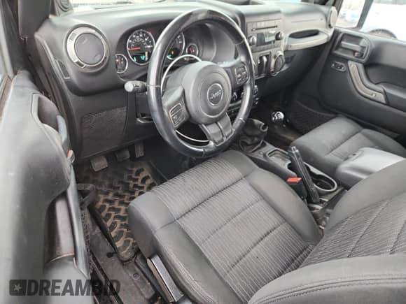 2012 Jeep Wrangler Sport with VIN 1C4AJWAG1CL224526, listed as a Copart auction lot 71076445 with 86,352 mi miles and Salvage title. Bid and sale history available at DreamBid. Image 8.