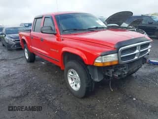 2002 Dodge Dakota SLT with VIN 1B7HG48N72S564130, listed as a IAAI auction lot 41561697 with 188,946 mi miles and . Bid and sale history available at DreamBid. Image 1.