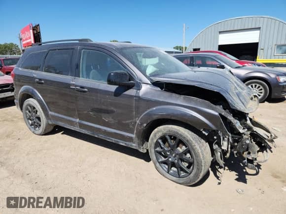 2019 Dodge Journey SE with VIN 3C4PDCBG2KT731551, listed as a Copart auction lot 82151025 with Not provided miles and Salvage title. Bid and sale history available at DreamBid. Image 4.