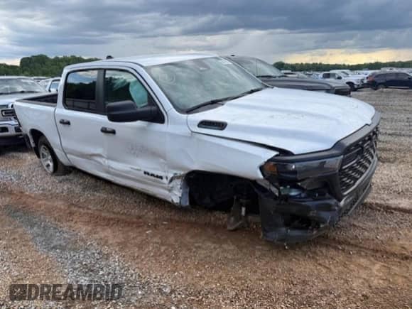 2025 Ram 1500 Tradesman with VIN 1C6RREGG8SN552310, listed as a Copart auction lot 56547005 with 9,767 mi miles and Salvage title. Bid and sale history available at DreamBid. Image 4.